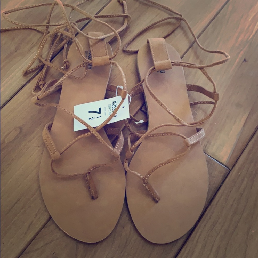 Mossimo brown tie up sandals. NEVER WORN.
